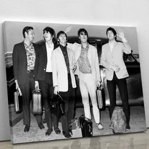 The Beatles and Brian Epstein at London Airport Canvas Print or Poster